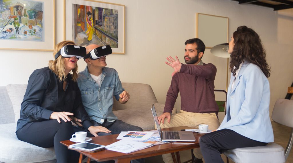 Clients using virtual reality headset for interior design planning in Quebec with Design KG